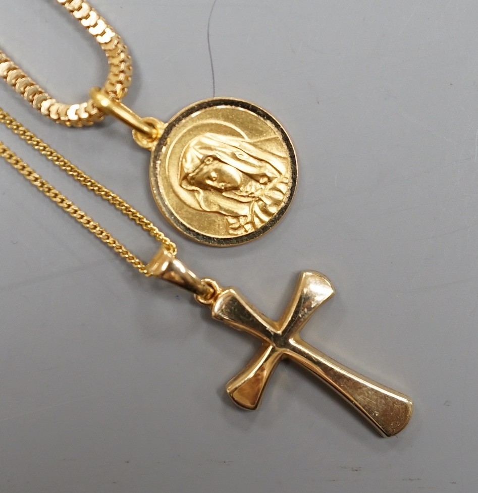 A modern Italian 750 yellow metal pendant on chain, gross 7.7 grams and a 375 cross pendant on a 9ct chain, 1.9 grams.